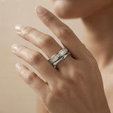 Argent Bamboo Baguette Stack Ring - worn on fair skin model hand showing double band profile and baguette crystals