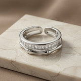 Argent Bamboo Baguette Stack Ring - front elevated view on marble showing plain upper band and baguette crystal lower band