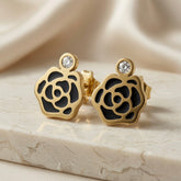 Camélia Noir Crystal Earrings - black enamel drop style pair on marble showing crystal bezel stud top and camellia flower drop