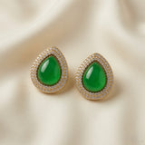 Impériale Jade Pavé Earrings - pair on ivory silk showing pear cabochon emerald green crystal in double halo pavé zirconia gold setting