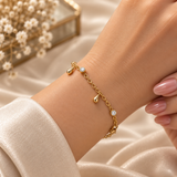 Gold Raindrop and Crystal Bezel Station Bracelet