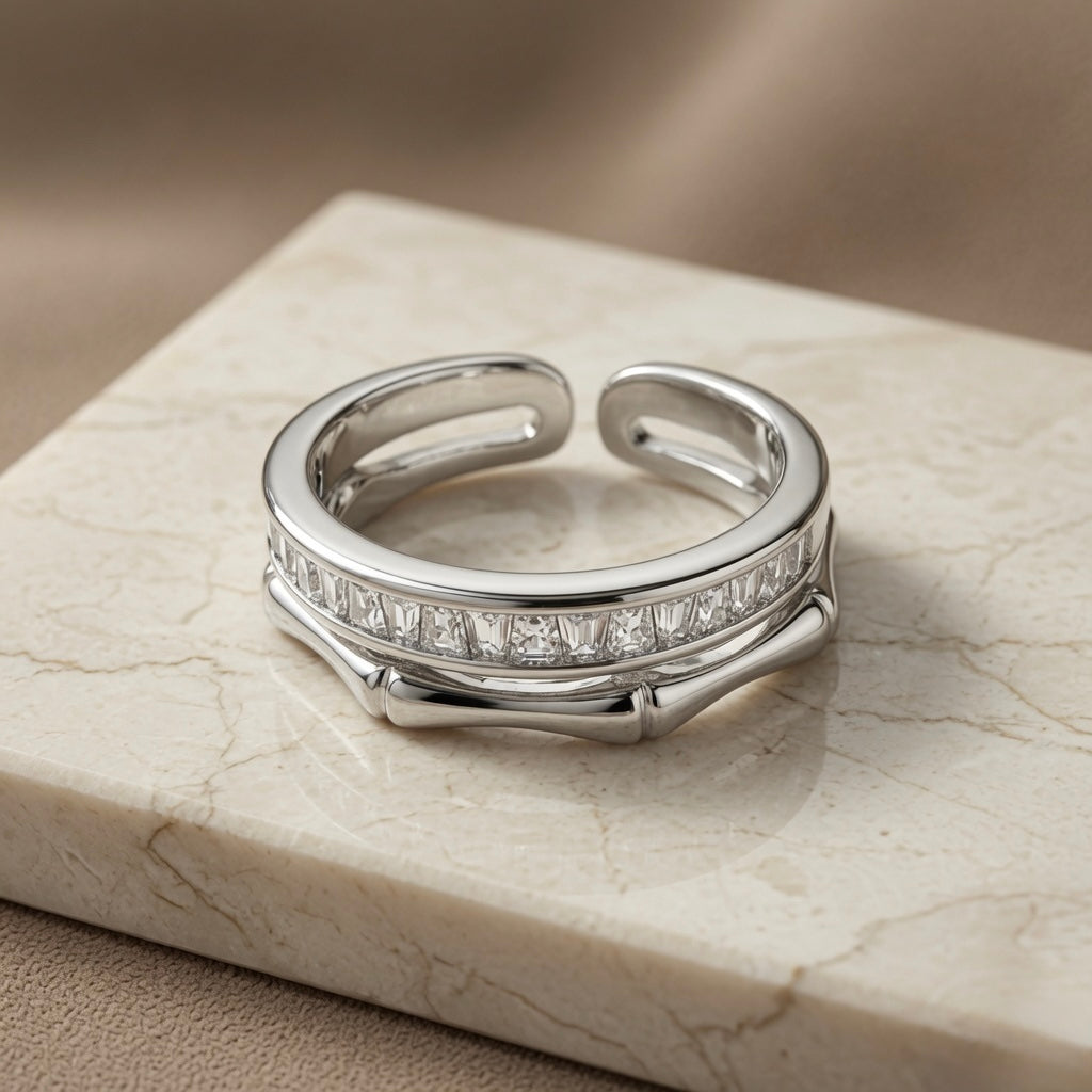 Argent Bamboo Baguette Stack Ring - front elevated view on marble showing plain upper band and baguette crystal lower band