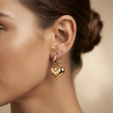 Heart & Evil Eye Mismatched Hoop Earrings - heart hoop worn on model ear side profile