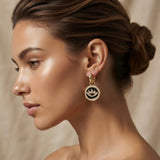 Heart & Evil Eye Mismatched Hoop Earrings - evil eye coin hoop worn on model ear side profile