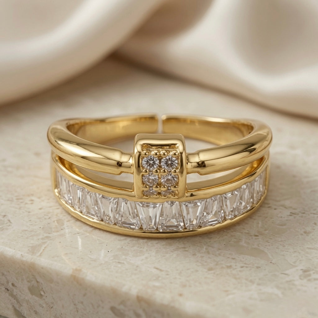 Or Baguette Clasp Stack Ring - elevated front view on marble with silk backdrop showing full width and clasp detail