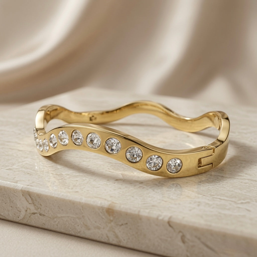 Wave Crystal Bangle - side view showing crystal graduation on marble