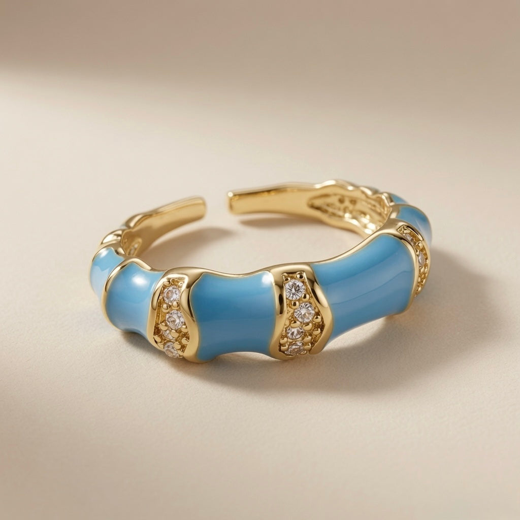 Azure Bamboo Enamel Ring - elevated angled view showing blue enamel segments and gold pavé connectors