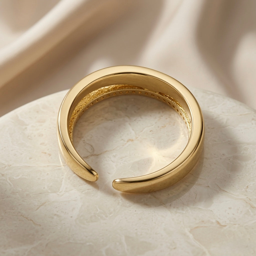 Rose Duo Stack Ring - back view on marble showing open adjustable back and hammered gold interior