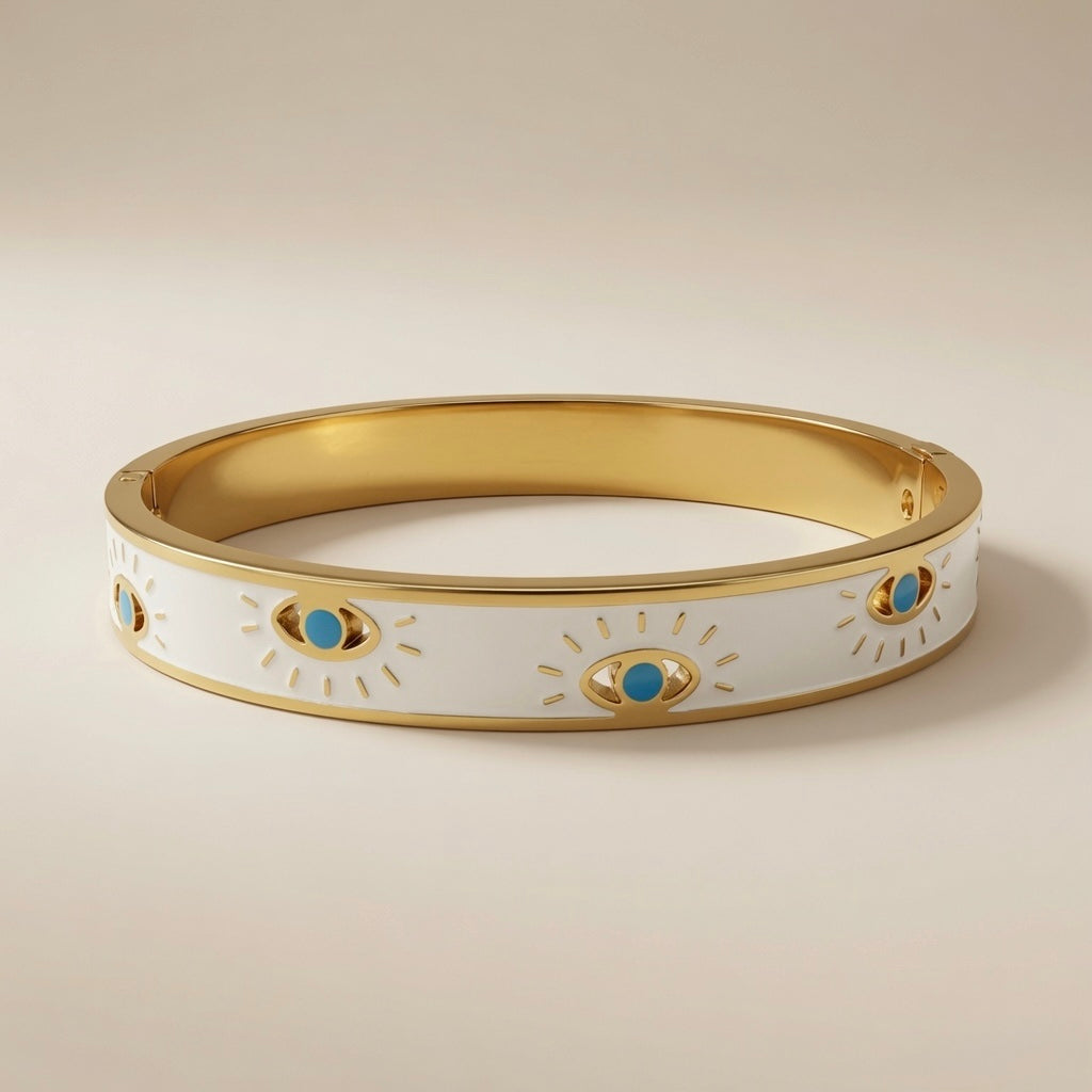 Evil Eye Enamel Bangle - front angled view showing evil eye motifs on white enamel