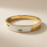 Evil Eye Enamel Bangle - side view showing hinged clasp and gold interior