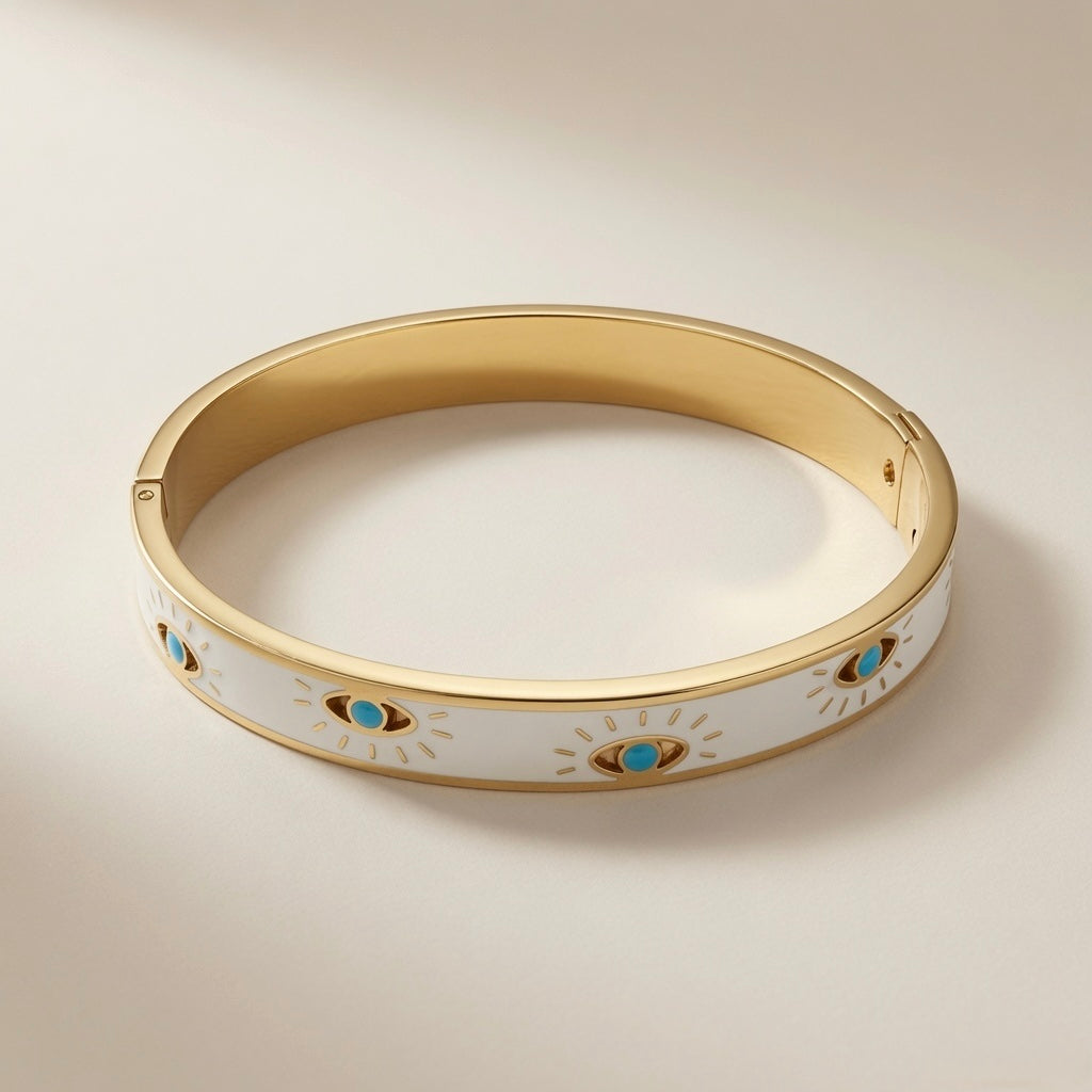 Evil Eye Enamel Bangle - elevated angled view showing evil eye detail and gold frame