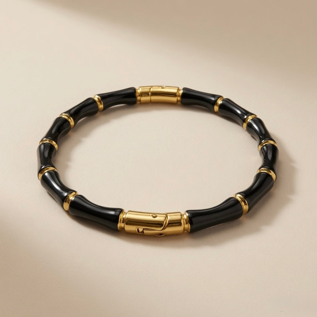 Noir Bamboo Enamel Bangle - angled flat lay showing clasp detail
