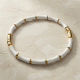 Blanc Bamboo Enamel Bangle - top-down flat lay on marble