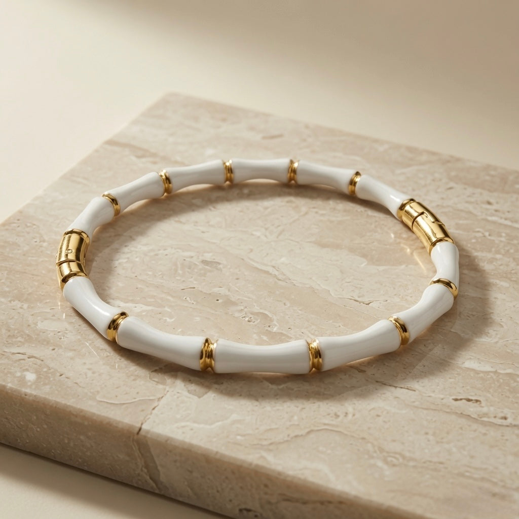 Blanc Bamboo Enamel Bangle - angled view on marble block
