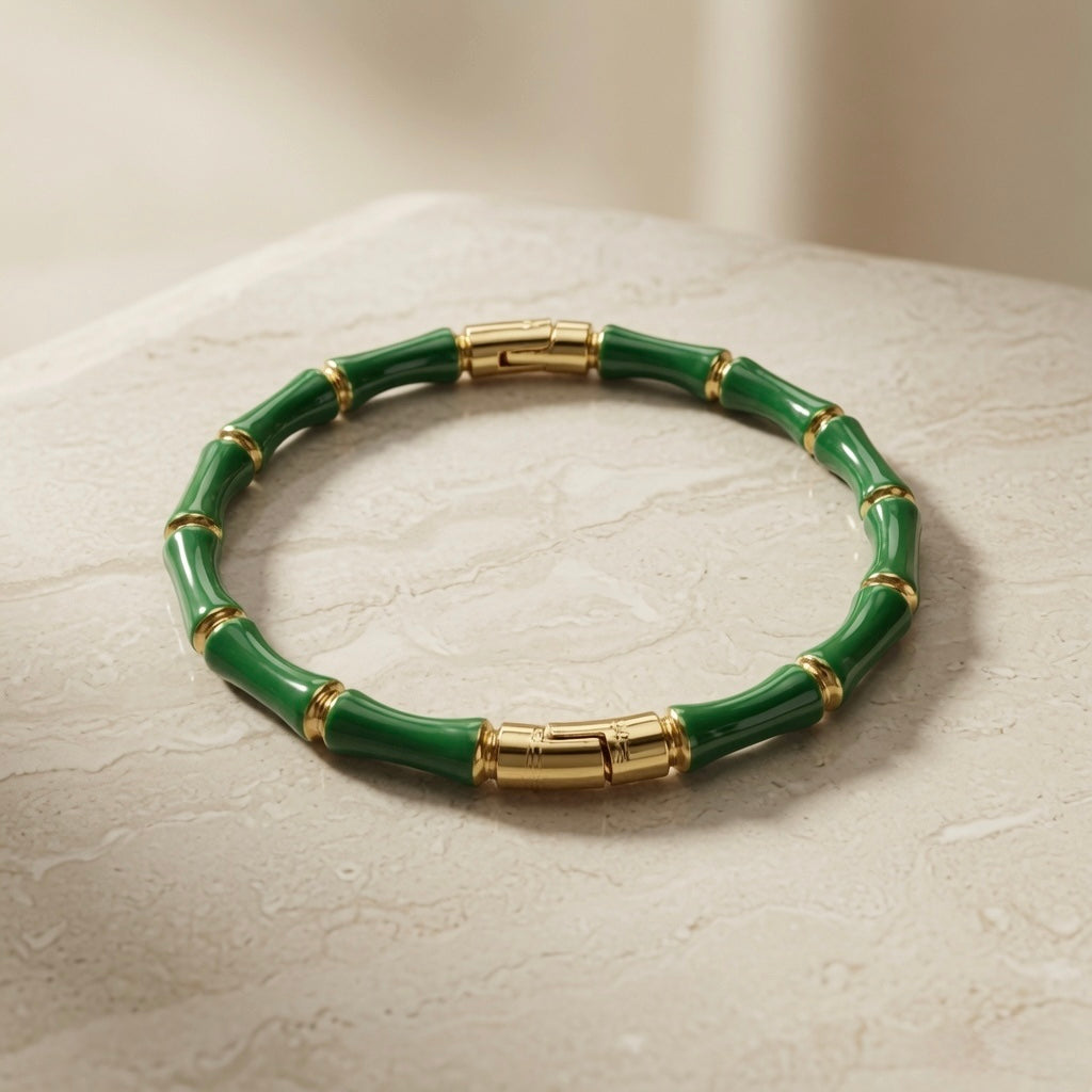 Vert Bamboo Enamel Bangle - angled view on travertine marble