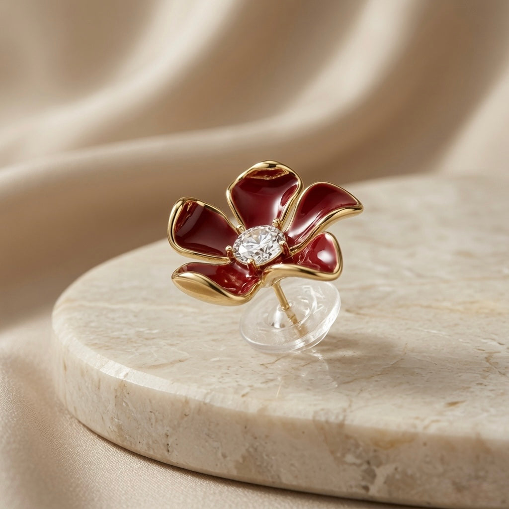 Vigne Crystal Fleur Stud Earrings - single earring on marble disc with silk backdrop showing side profile, butterfly back and round crystal