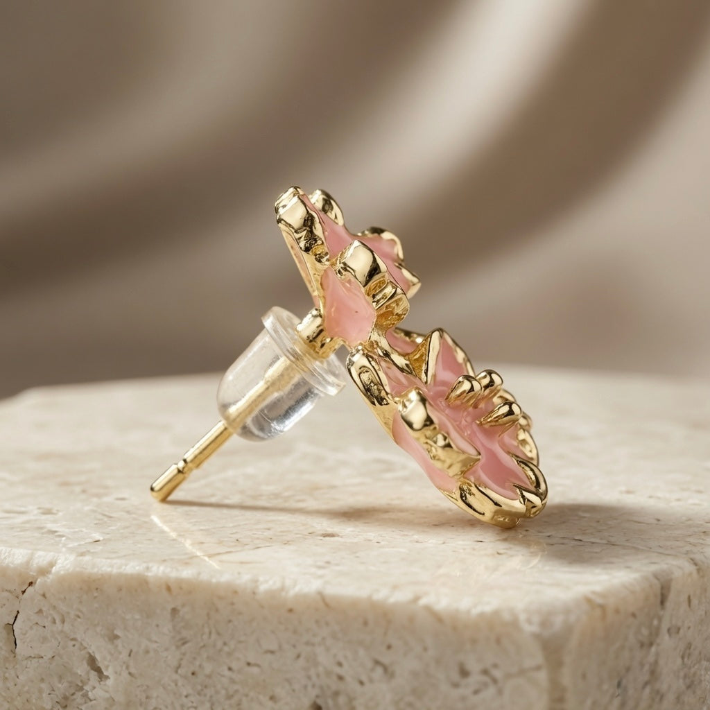 Sakura Bloom Cluster Stud Earrings - single earring side profile on travertine showing silicone butterfly back, gold post and blush petal depth