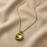 Pistache Cabochon Pendant Necklace - full necklace on silk showing satellite ball chain, lobster clasp extender and pendant drop length